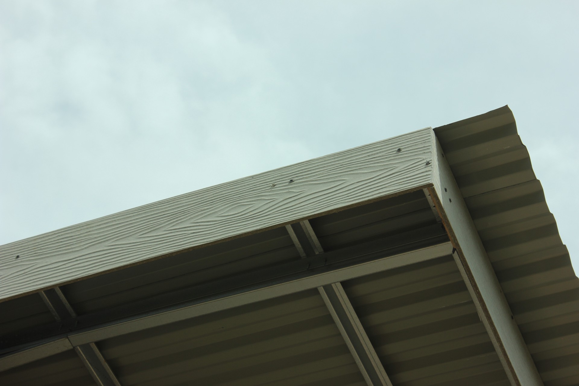 Genteng Metal Pasir vs Asbes, Mana yang Lebih Baik.JPG