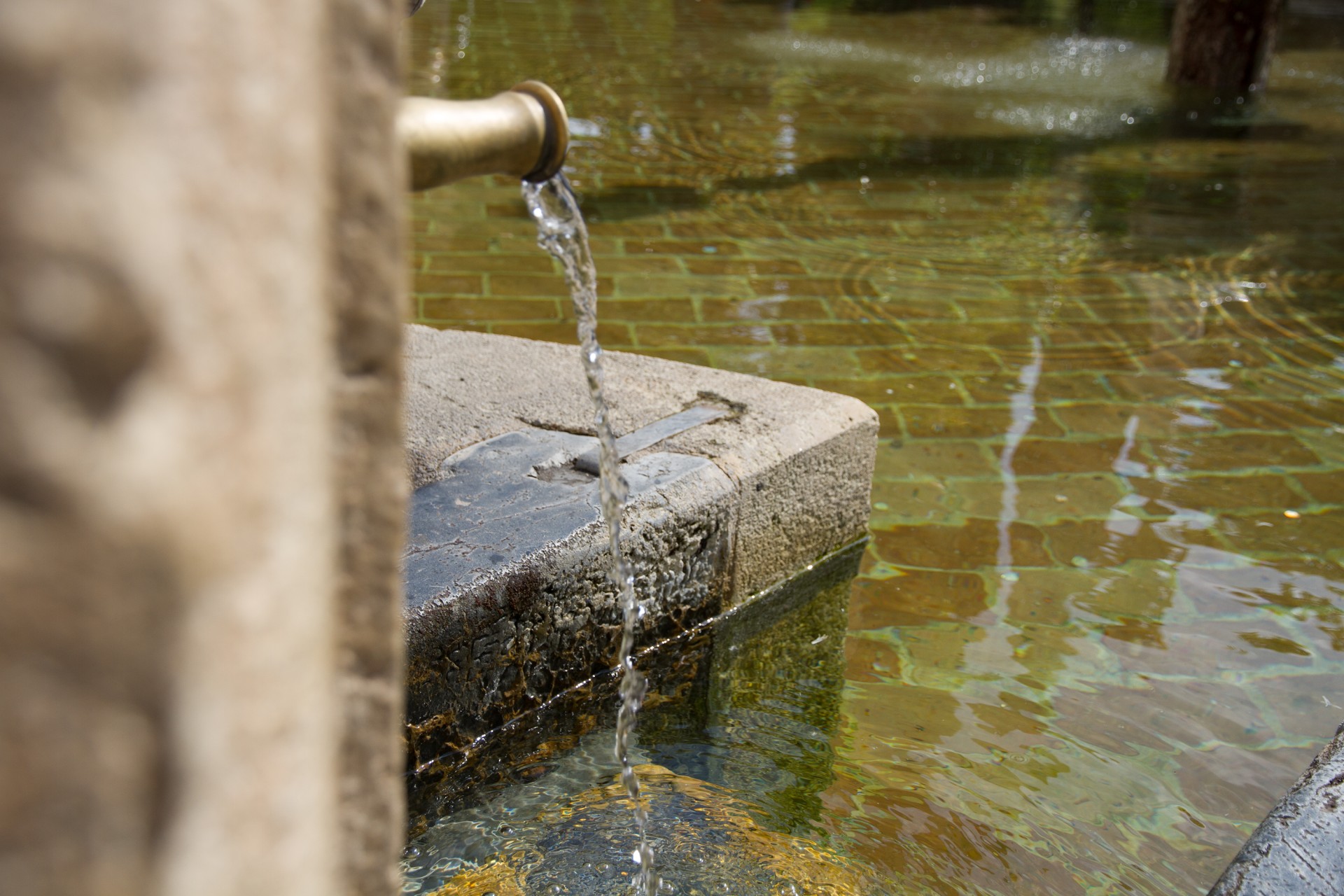 water-running-into-old-fountain-from.jpg